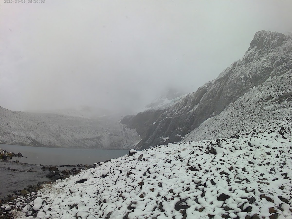 The Laguna Cerro Castillo hiking trail in Coyhaique, Chile under a snowy sky