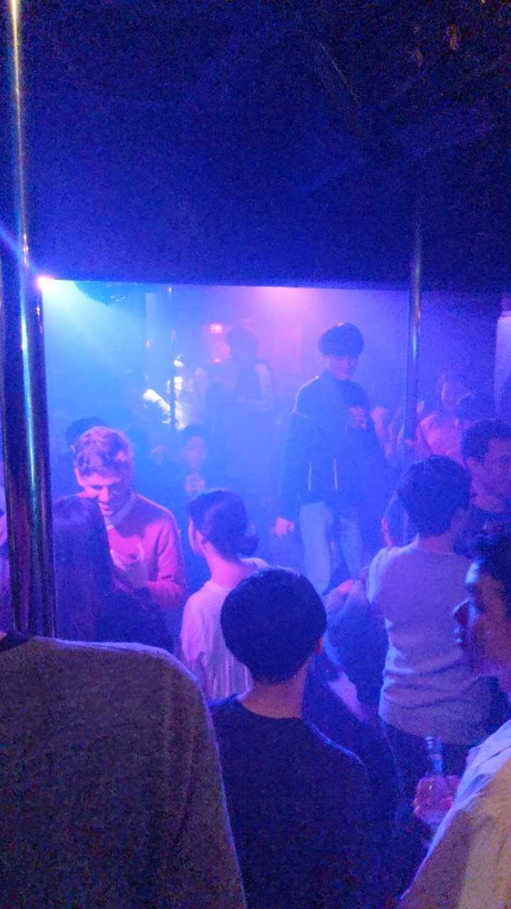 Visit Shinjuku Nichome in Tokyo for the world\'s highest concentration of LGBTQ bars - photo of dancing at Arty Farty